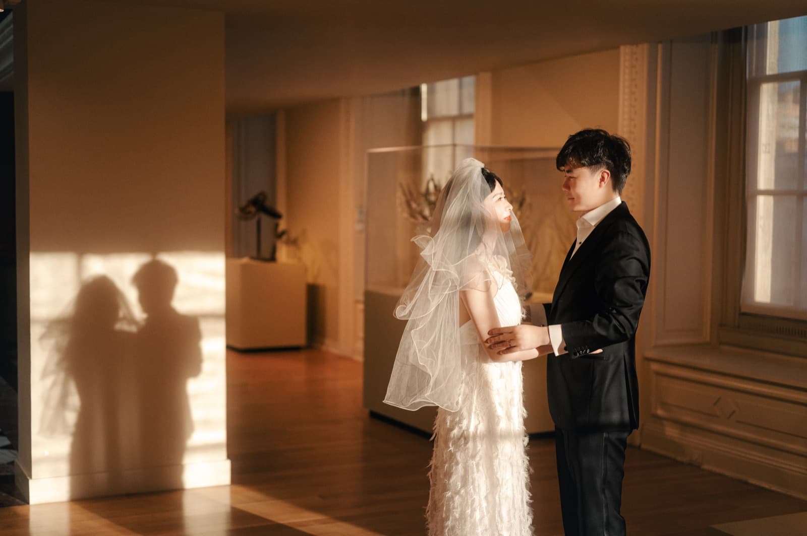 Couple sharing a quiet moment in golden light